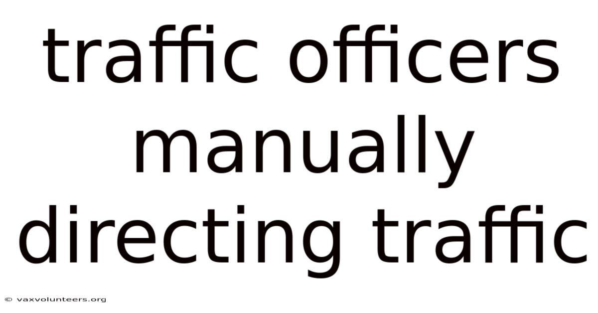 Traffic Officers Manually Directing Traffic